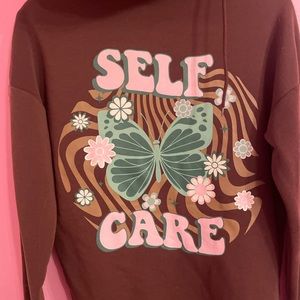 “Self Care” zip up. Size Medium